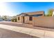 Single-story home featuring desert landscaping and a block wall for added privacy at 7317 S 37Th Gln, Phoenix, AZ 85041