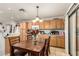 Eat in kitchen boasts wood cabinets, tile floors and plenty of natural light at 7317 S 37Th Gln, Phoenix, AZ 85041