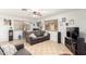 Open-concept living room with tile flooring, a ceiling fan, and comfortable seating at 7317 S 37Th Gln, Phoenix, AZ 85041