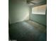 Cozy bedroom with natural light, neutral walls and ceiling fan at 735 E Desert Ave, Apache Junction, AZ 85119
