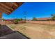 A spacious backyard featuring a block fence for privacy and a mix of landscaping at 7359 N 39Th Ave, Phoenix, AZ 85051