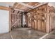 Unfinished basement area ready for customization, with wood paneling and shelving at 7359 N 39Th Ave, Phoenix, AZ 85051