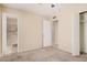 Neutral bedroom includes a ceiling fan, neutral carpeting, and closet at 7359 N 39Th Ave, Phoenix, AZ 85051