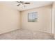 Neutral bedroom with plush carpeting and a ceiling fan at 7359 N 39Th Ave, Phoenix, AZ 85051