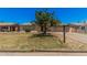 Inviting home with mature tree in the front yard, enhancing curb appeal and providing shade at 7359 N 39Th Ave, Phoenix, AZ 85051