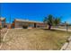 Charming home with a well-maintained lawn and a lovely shade tree in the front yard at 7359 N 39Th Ave, Phoenix, AZ 85051
