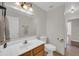 Bathroom with a single sink vanity, a large mirror, and tile floors at 7405 W Elwood St, Phoenix, AZ 85043