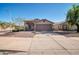 Charming single-story home with a well-maintained front yard and a spacious two-car garage at 7405 W Elwood St, Phoenix, AZ 85043