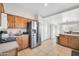 Spacious kitchen features stainless steel appliances and ample counter space, perfect for cooking and entertaining at 7405 W Elwood St, Phoenix, AZ 85043