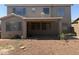 Backyard features a covered patio and low maintenance landscaping with gravel at 7422 W Superior Ave, Phoenix, AZ 85043