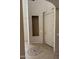 Inviting entryway with tile flooring, niche, and a view of the interior features at 7422 W Superior Ave, Phoenix, AZ 85043