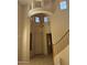 Open foyer showcasing a staircase, chandelier, and unique architectural details at 7422 W Superior Ave, Phoenix, AZ 85043