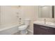 Cozy bathroom features bathtub, toilet, and vanity with storage at 802 W Buist Ave, Phoenix, AZ 85041
