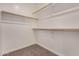 A walk-in closet with carpet and shelving at 802 W Buist Ave, Phoenix, AZ 85041