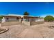 View of the backyard featuring a stucco wall with metal security fence at 871 Leisure World --, Mesa, AZ 85206