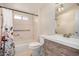 Bathroom with floral shower curtain, toilet, and vanity at 871 Leisure World --, Mesa, AZ 85206