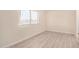 Bedroom featuring modern flooring and neutral paint colors at 871 Leisure World --, Mesa, AZ 85206
