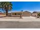 Inviting home with desert landscaping, a two-car garage, and a welcoming front patio at 871 Leisure World --, Mesa, AZ 85206