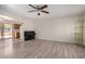 Spacious living room featuring modern flooring and a ceiling fan at 871 Leisure World --, Mesa, AZ 85206