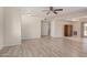 Spacious living room featuring wood-look flooring and neutral walls, creating a welcoming atmosphere at 871 Leisure World --, Mesa, AZ 85206