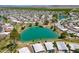 Aerial view of a community with multiple ponds, golf courses, and lush landscaping at 9339 E Sun Lakes N Blvd, Sun Lakes, AZ 85248
