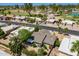 An aerial view of a home with a charming backyard, lush landscaping and a golf course community at 9339 E Sun Lakes N Blvd, Sun Lakes, AZ 85248