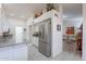 Modern kitchen with stainless steel appliances, granite counters, white cabinets, and an open layout at 9339 E Sun Lakes N Blvd, Sun Lakes, AZ 85248