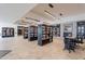 Spacious library area with bookshelves, tables, and a cozy fireplace at 9339 E Sun Lakes N Blvd, Sun Lakes, AZ 85248