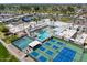 Aerial view of a luxurious recreation area with swimming pool, tennis and pickleball courts at 9339 E Sun Lakes N Blvd, Sun Lakes, AZ 85248