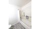 Bathroom featuring a tub/shower combo with white shower curtain and safety grab bar at 9625 W Mountain View Rd # B, Peoria, AZ 85345