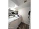 The laundry room features a washer, dryer, shelving, and tile floor at 9625 W Mountain View Rd # B, Peoria, AZ 85345