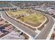 Aerial view highlighting neighborhood green space with walking paths and desert landscaping at 9723 W Patrick Ln, Peoria, AZ 85383