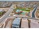 An aerial view of neighborhood amenities that includes a pool, sports courts and a recreation center at 9723 W Patrick Ln, Peoria, AZ 85383