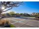 Community space with tables and green space for residents to enjoy near neighborhood homes at 9723 W Patrick Ln, Peoria, AZ 85383