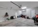 Spacious garage, perfect for parking vehicles, storage, or a workshop area at 9723 W Patrick Ln, Peoria, AZ 85383