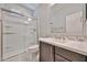 Clean bathroom featuring a glass-enclosed shower, a vanity and great light at 10739 W Sierra Pinta Dr, Peoria, AZ 85373