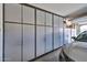 Garage with wall-mounted storage cabinets for organization and parking for a car at 10739 W Sierra Pinta Dr, Peoria, AZ 85373