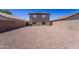 Spacious backyard, ideal for and pets with privacy fencing, offering a secure and comfortable outdoor environment at 11215 W Heatherbrae Dr, Phoenix, AZ 85037