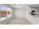 Dining area with natural light, tile floors, and adjacent to the kitchen area at 11215 W Heatherbrae Dr, Phoenix, AZ 85037