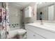 Bright bathroom featuring updated shower-tub, vanity, mirror and colorful decor at 1402 E Guadalupe Rd # 114, Tempe, AZ 85283