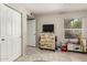 Charming bedroom with playful decor, featuring a cute chest of drawers and play kitchen at 1402 E Guadalupe Rd # 114, Tempe, AZ 85283