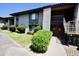 Two-story apartment building with a well-maintained lawn and manicured bushes at 1402 E Guadalupe Rd # 114, Tempe, AZ 85283