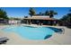 Community pool perfect for relaxation, with lounge chairs and a shallow area at 1402 E Guadalupe Rd # 114, Tempe, AZ 85283