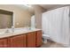 Bathroom with a double sink vanity and a shower and tub combo at 14436 N 162Nd Ln, Surprise, AZ 85379