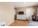 Well-lit bedroom with sleek floors, a modern dresser and shelving, and lots of storage at 14436 N 162Nd Ln, Surprise, AZ 85379