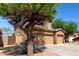 Charming two-story home featuring a tile roof and a spacious two-car garage at 14436 N 162Nd Ln, Surprise, AZ 85379