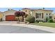 Well-maintained home with warm accents, mature landscaping, and a terra cotta roof at 1535 W Winter Dr, Phoenix, AZ 85021