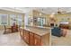 An open-concept kitchen boasts granite countertops and seamless flow to dining and living spaces at 1535 W Winter Dr, Phoenix, AZ 85021