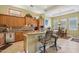 Charming kitchen features granite countertops, custom cabinetry, and sunny breakfast nook at 1535 W Winter Dr, Phoenix, AZ 85021
