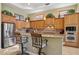 Eat-in kitchen with stainless steel appliances, granite countertops, and mosaic backsplash at 1535 W Winter Dr, Phoenix, AZ 85021